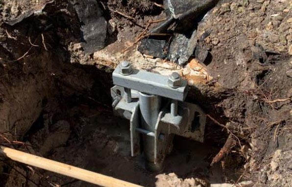 helical underpinning foundation